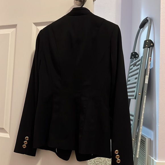 WHBM size 2 black jacket with ruffles and usable pockets. Very gently used. - Picture 10 of 13